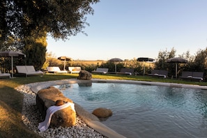 Outdoor pool, a rooftop pool, sun loungers