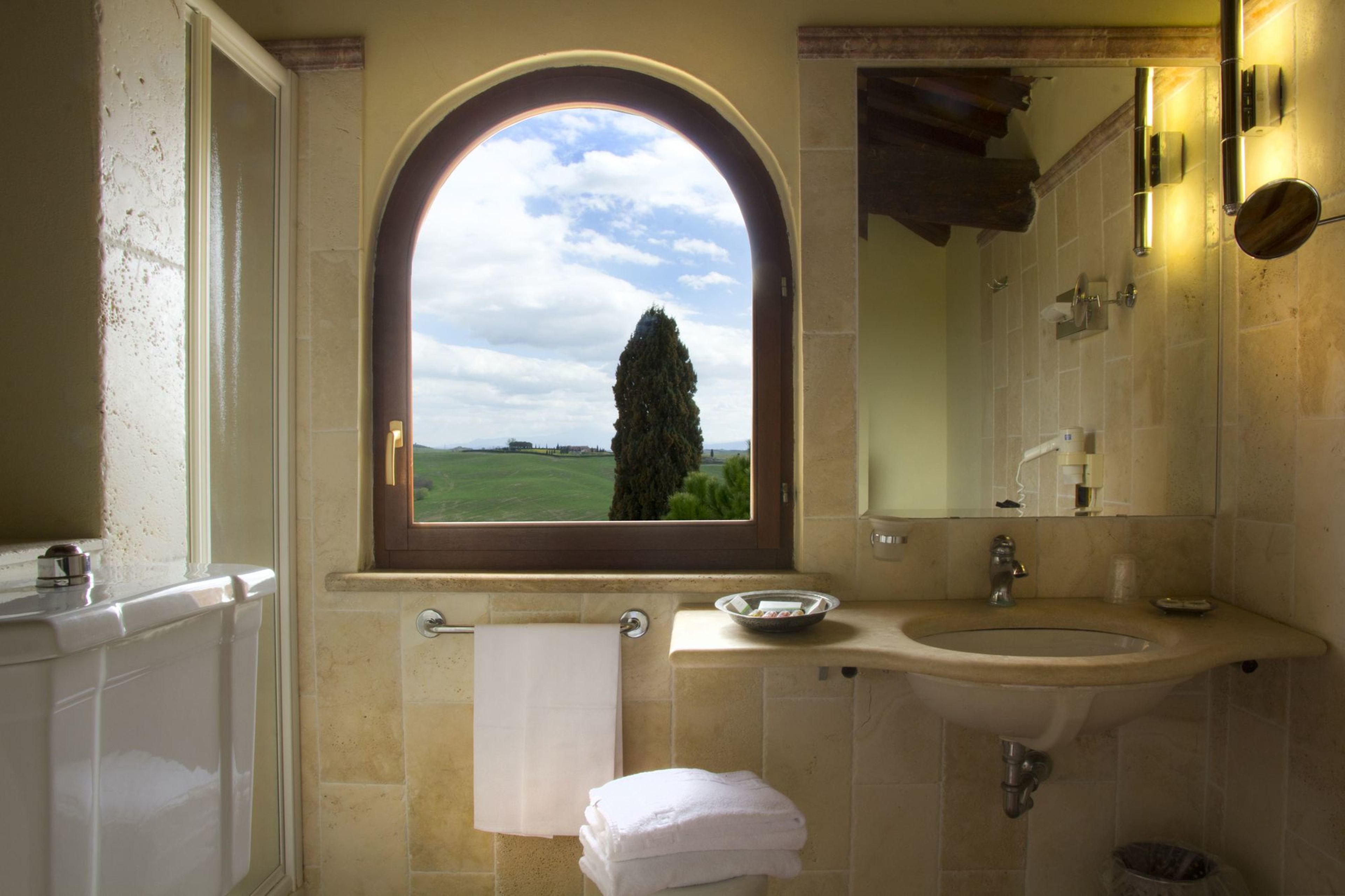 hair dryer, bathrobes, slippers, bidet