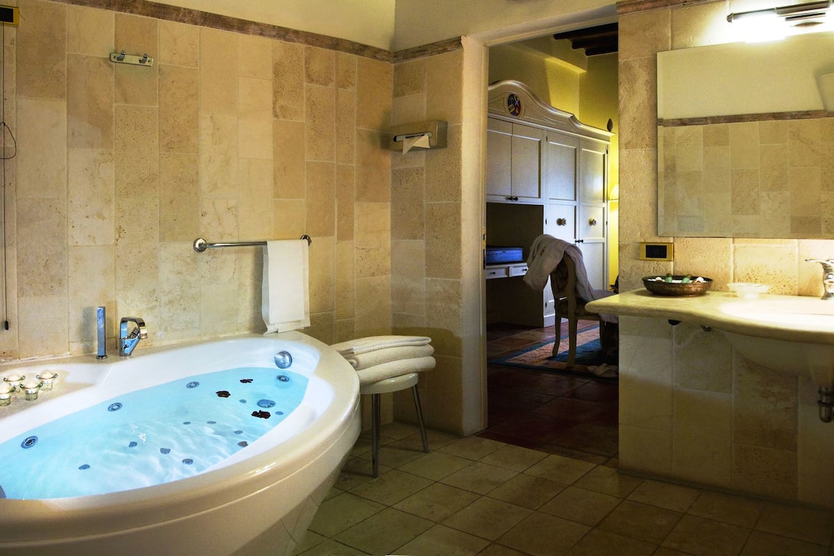 hair dryer, bathrobes, slippers, bidet