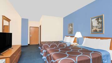 A hotel room with two beds, a TV, a dresser, and a painting on the wall.