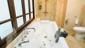 Deluxe C Room | Bathroom | Separate bathtub and shower, rainfall showerhead, designer toiletries