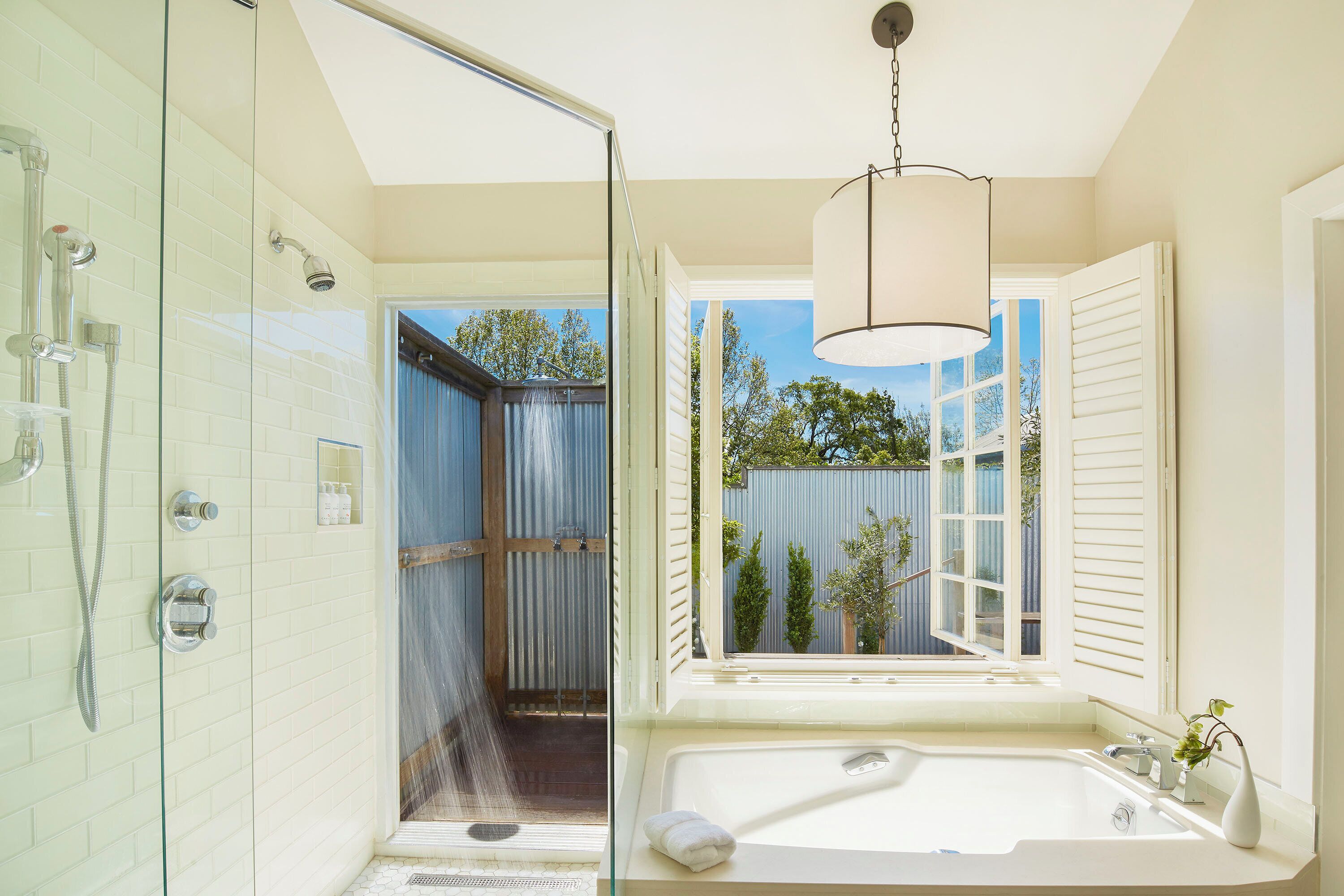 separate bathtub and shower, deep-soaking bathtub, rainfall showerhead