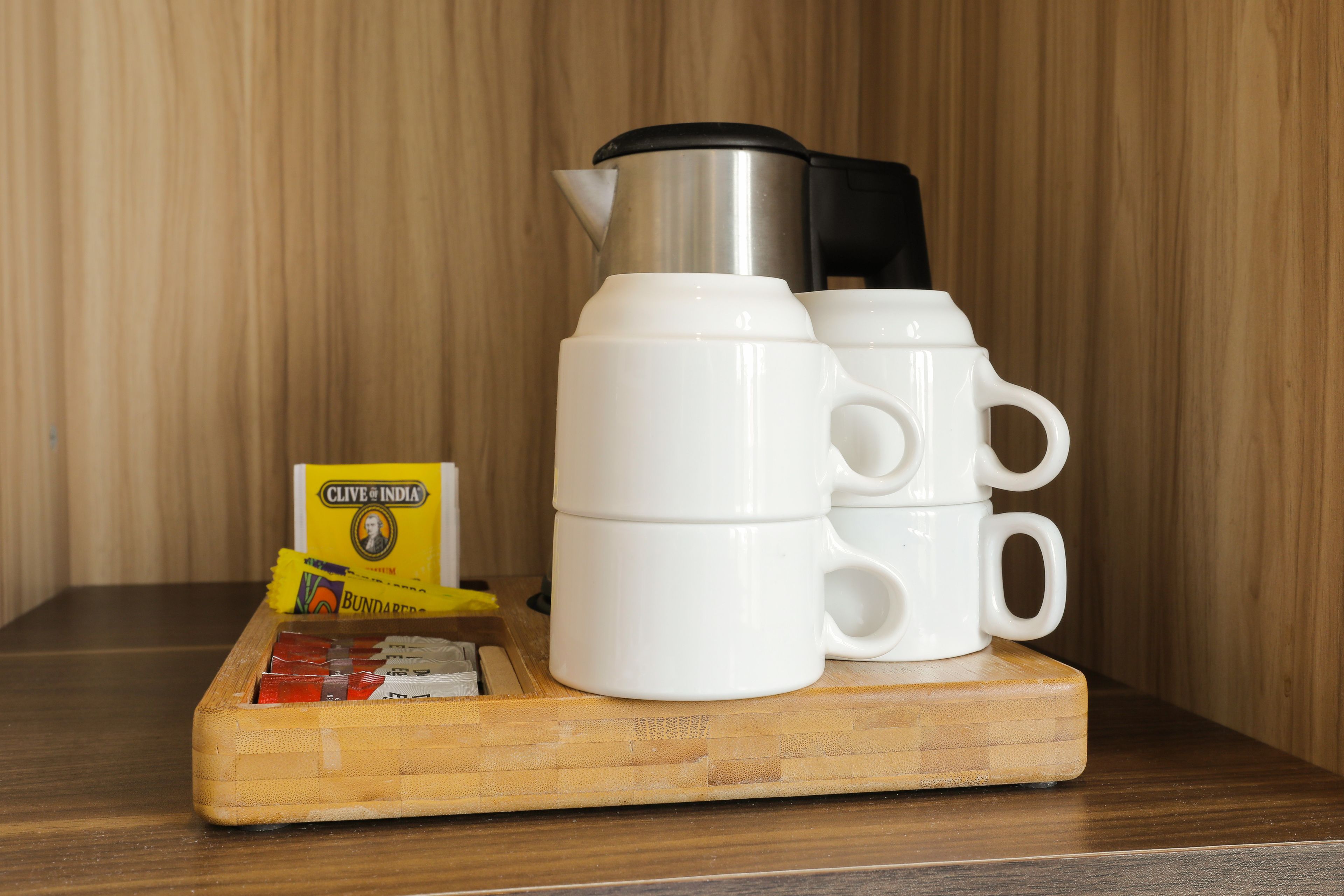 budget family room with shared bathroom | coffee and/or coffee maker