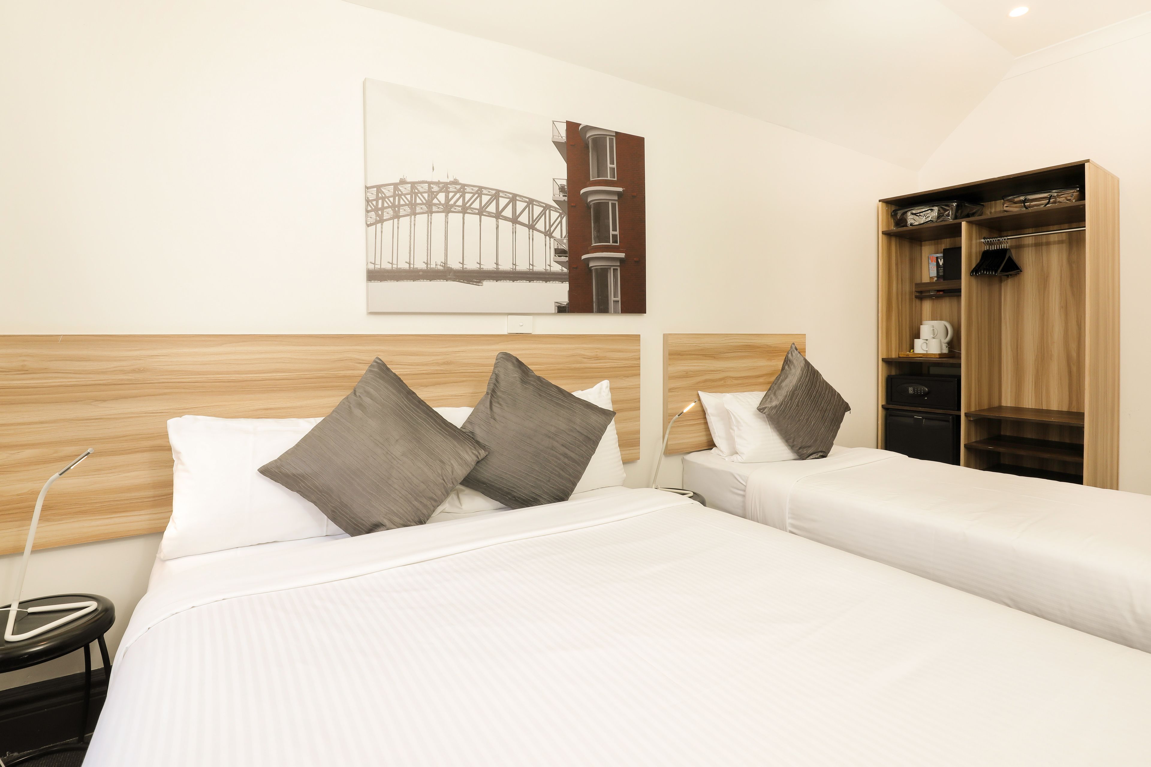 triple room with shared bathroom  | in-room safe, desk, free wifi, bed sheets