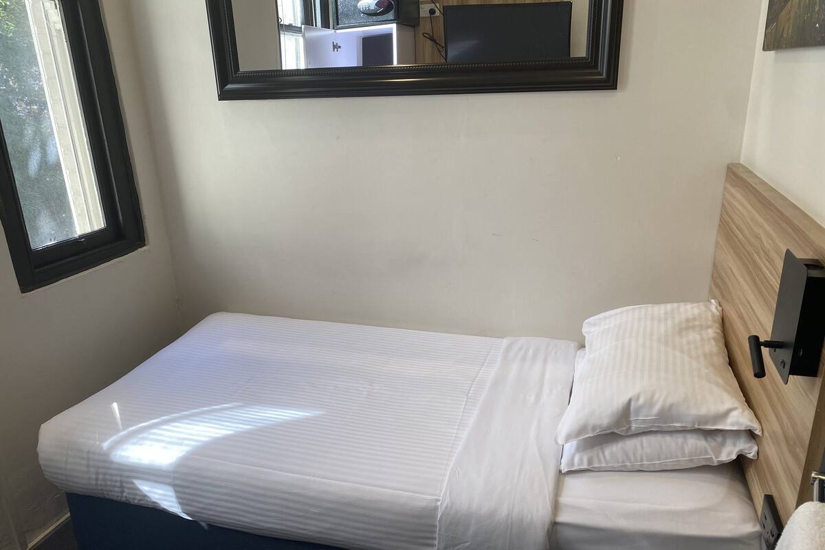 Economy Single Room | In-room safe, desk, free WiFi, bed sheets