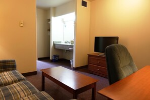 Desk, soundproofing, iron/ironing board, free cribs/infant beds