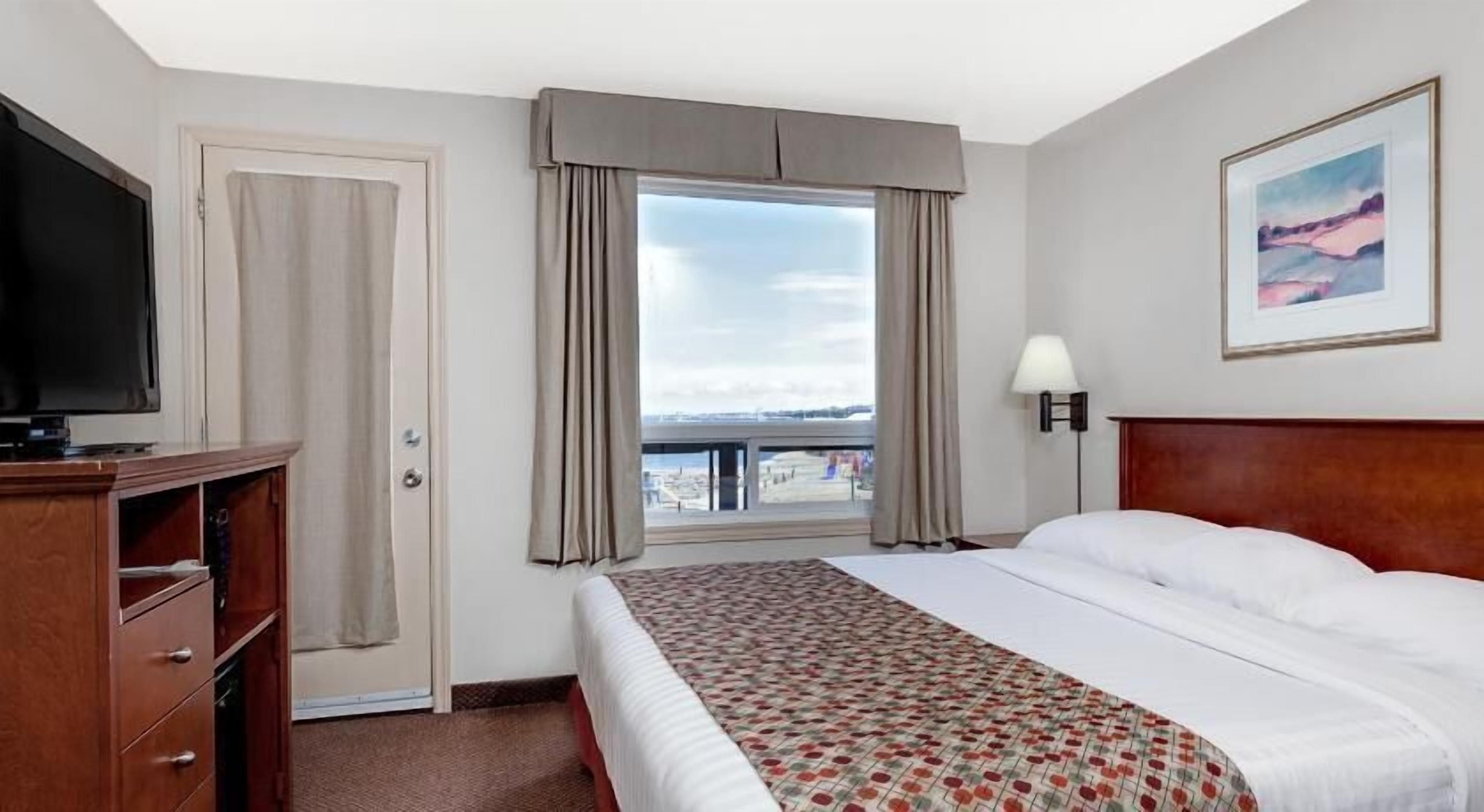 Desk, soundproofing, iron/ironing board, free cribs/infant beds