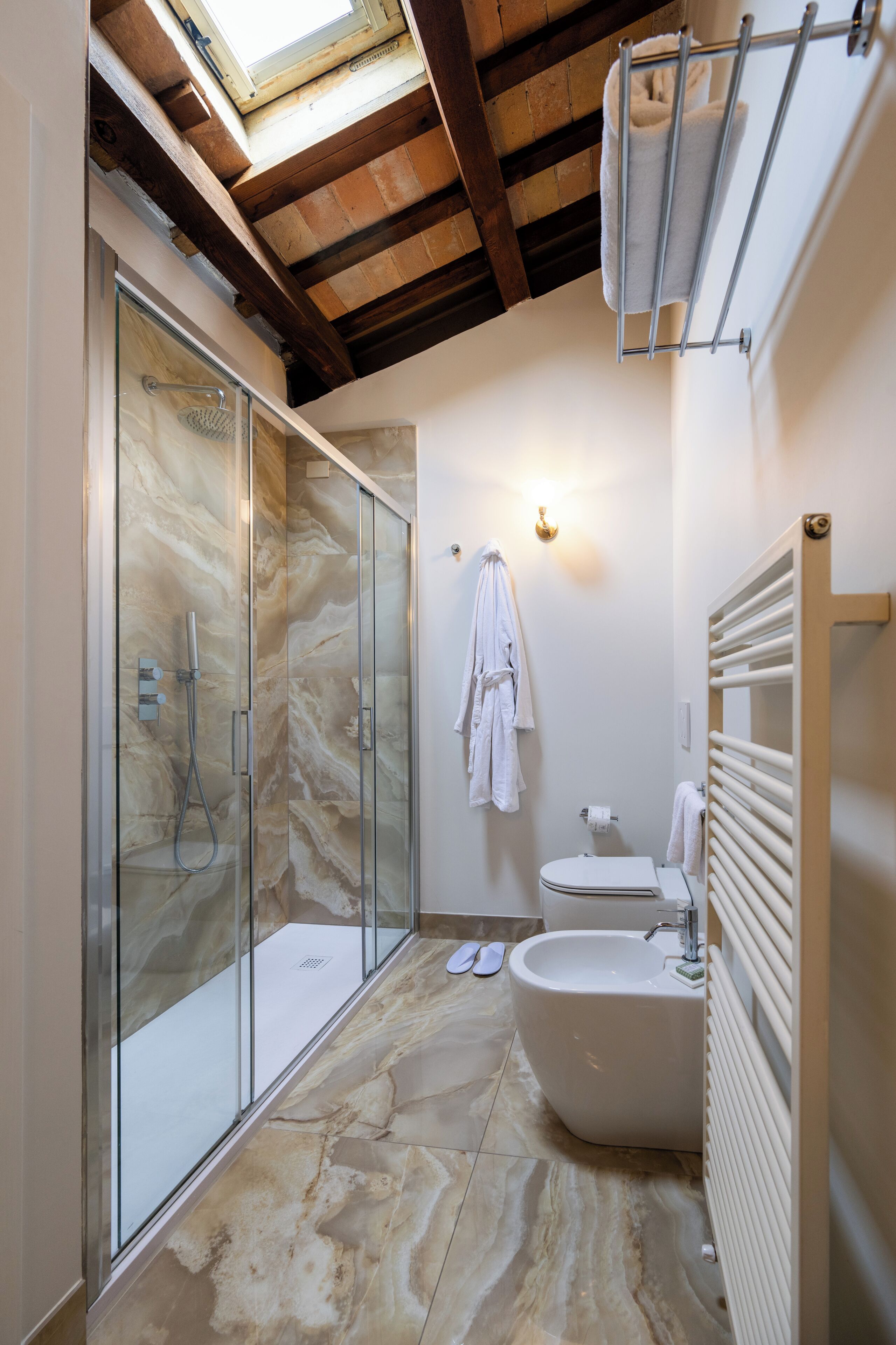 deluxe room (palazzo viviani) | bathroom | shower, rainfall showerhead, free toiletries, hair dryer
