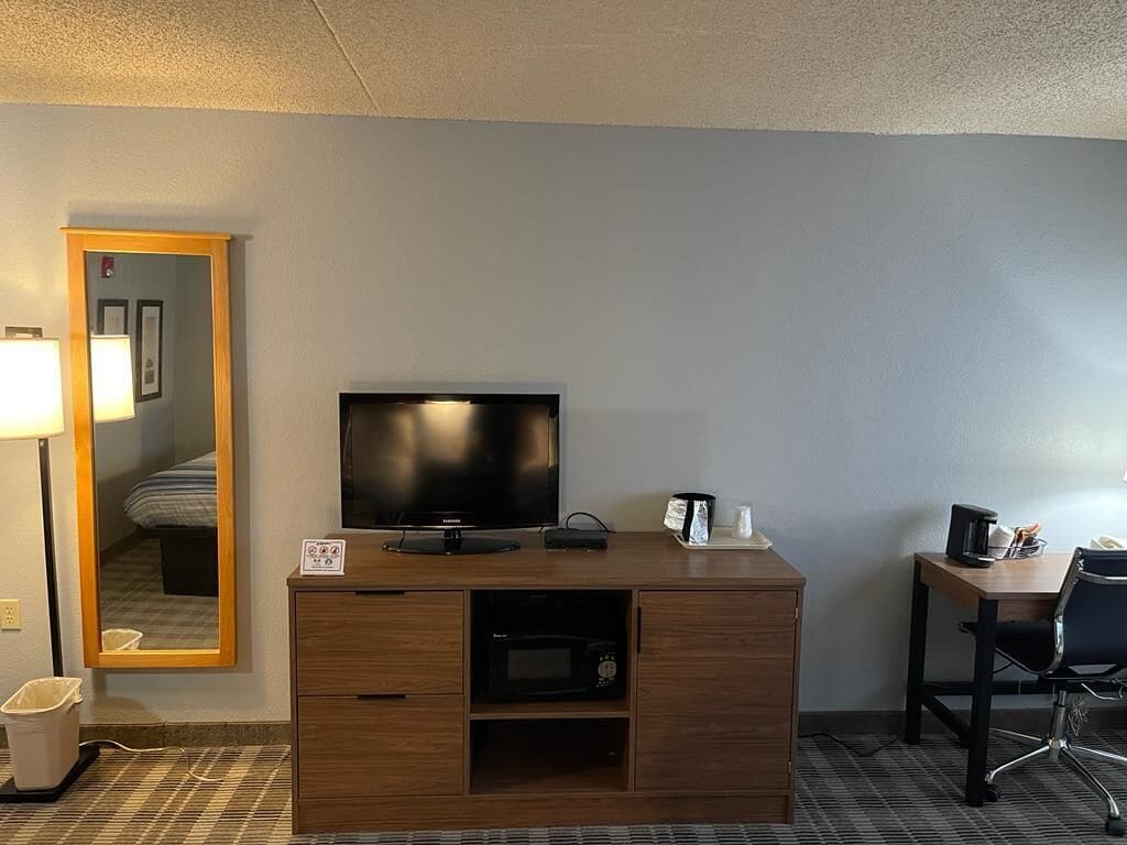 premium bedding, desk, laptop workspace, iron/ironing board