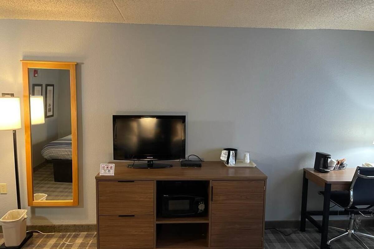 premium bedding, desk, laptop workspace, iron/ironing board