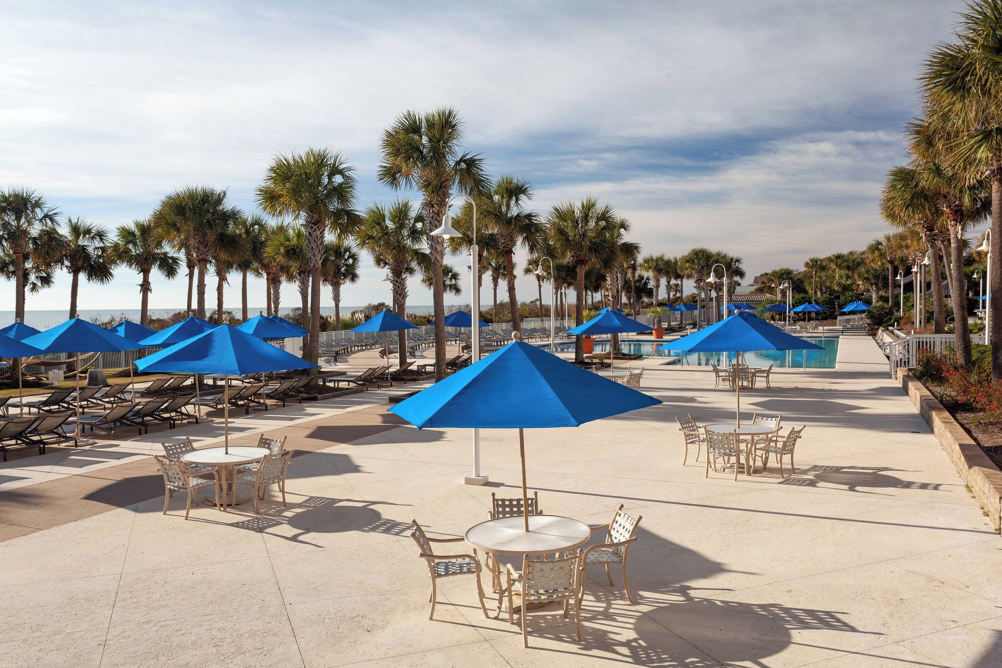 indoor pool, outdoor pool, open 7:00 am to 11:00 pm, pool umbrellas