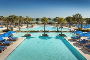 Indoor pool, outdoor pool, open 7:00 AM to 11:00 PM, pool umbrellas