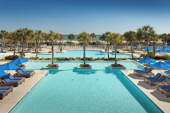 Indoor pool, outdoor pool, open 7:00 AM to 11:00 PM, pool umbrellas at Marriott Myrtle Beach Resort & Spa at Grande Dunes