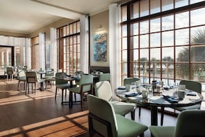 Daily buffet breakfast (USD 23 per person)