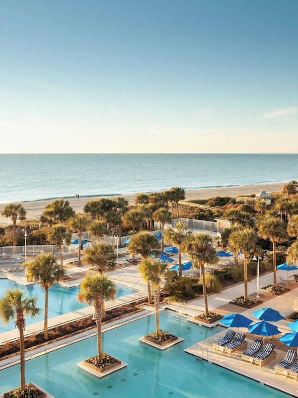 Indoor pool, outdoor pool, open 7:00 AM to 11:00 PM, pool umbrellas