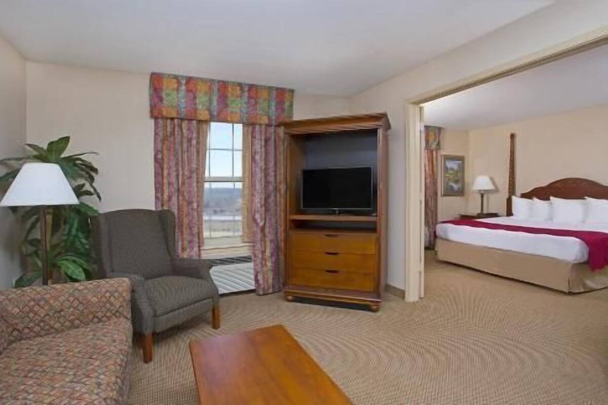 Desk, blackout drapes, iron/ironing board, rollaway beds