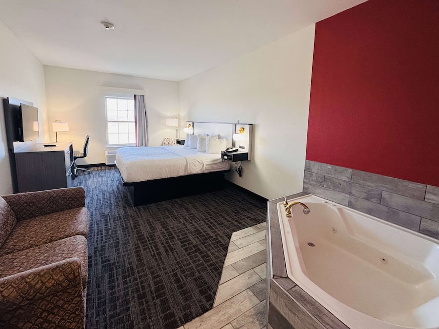 Desk, blackout drapes, iron/ironing board, rollaway beds