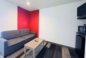 Studio Suite, 1 King Bed, Non Smoking | Desk, blackout drapes, iron/ironing board, WiFi (free)