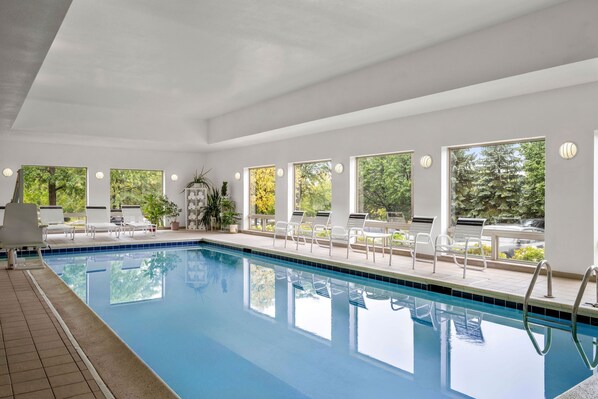 Indoor pool, open 7:00 AM to 10:00 PM, pool loungers