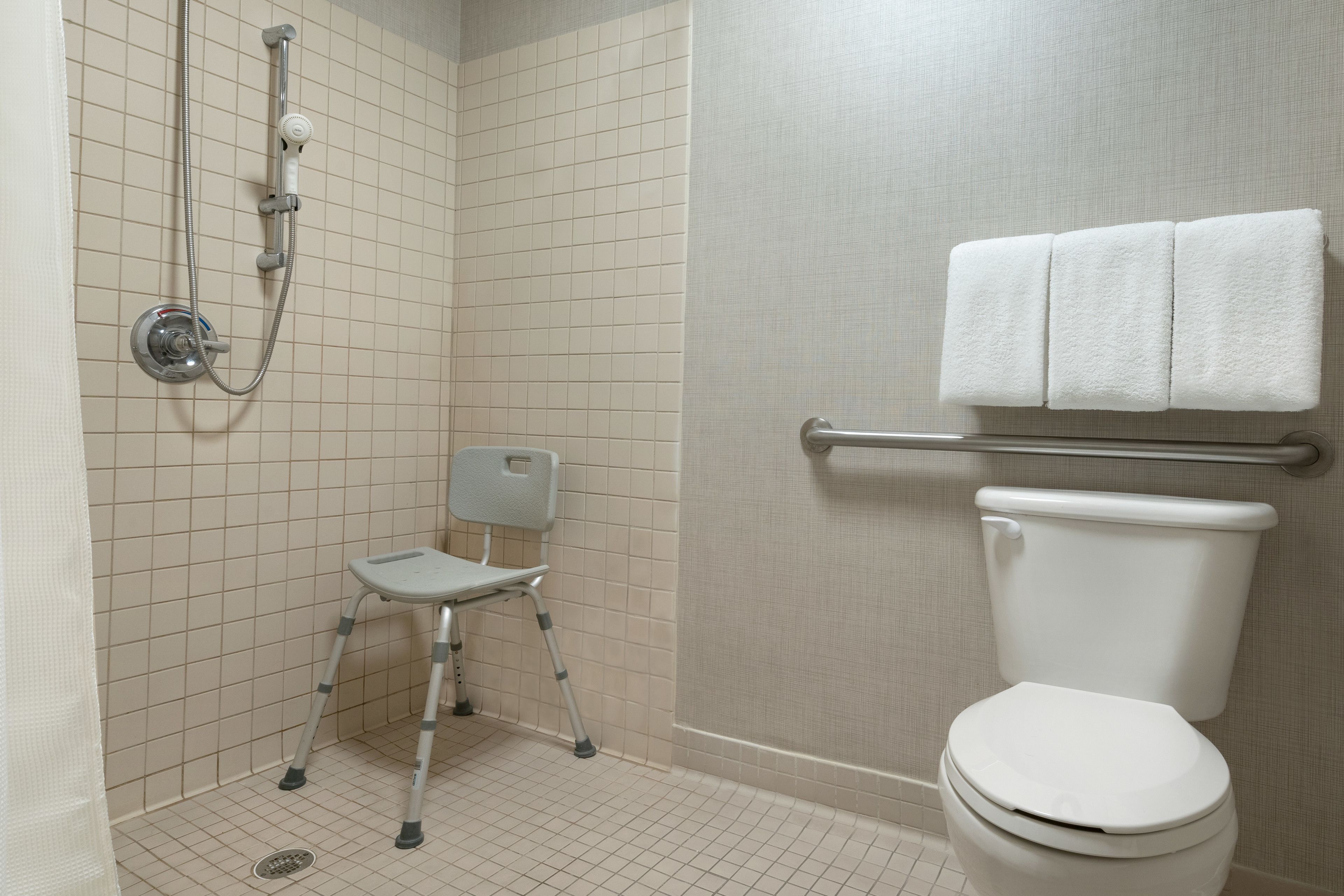 combined shower/bathtub, free toiletries, hair dryer, towels