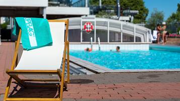 Indoor pool, seasonal outdoor pool, open 8 AM to 7 PM, sun loungers