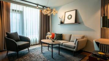 Suite, Balcony, City View | In-room safe, laptop workspace, blackout curtains, free WiFi