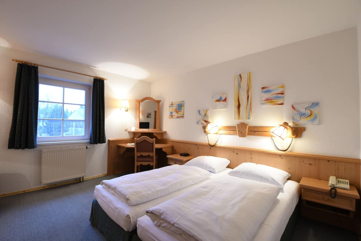 double room | individually decorated, desk, free cots/infant beds, rollaway beds