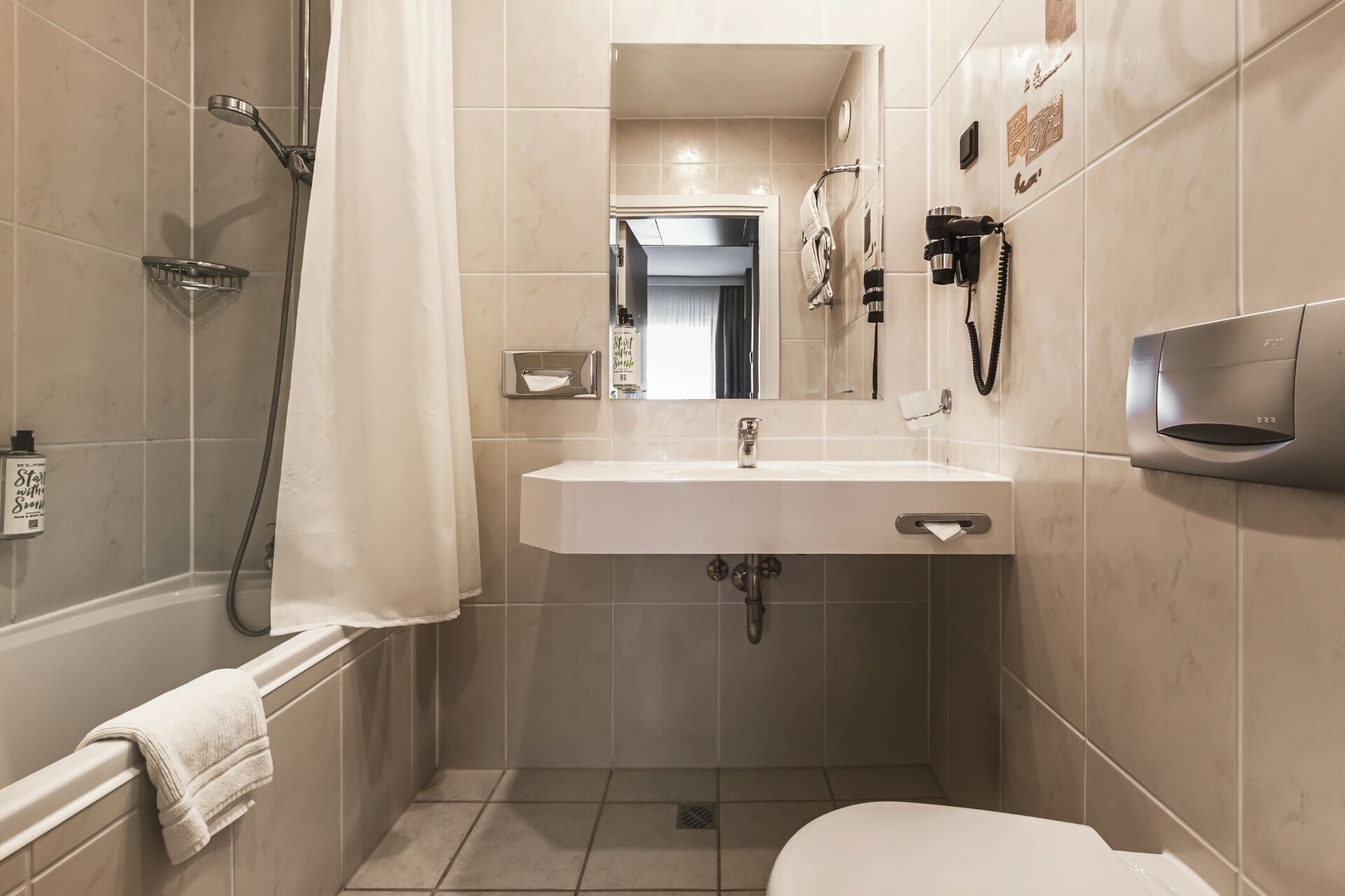 shower, free toiletries, hair dryer, towels