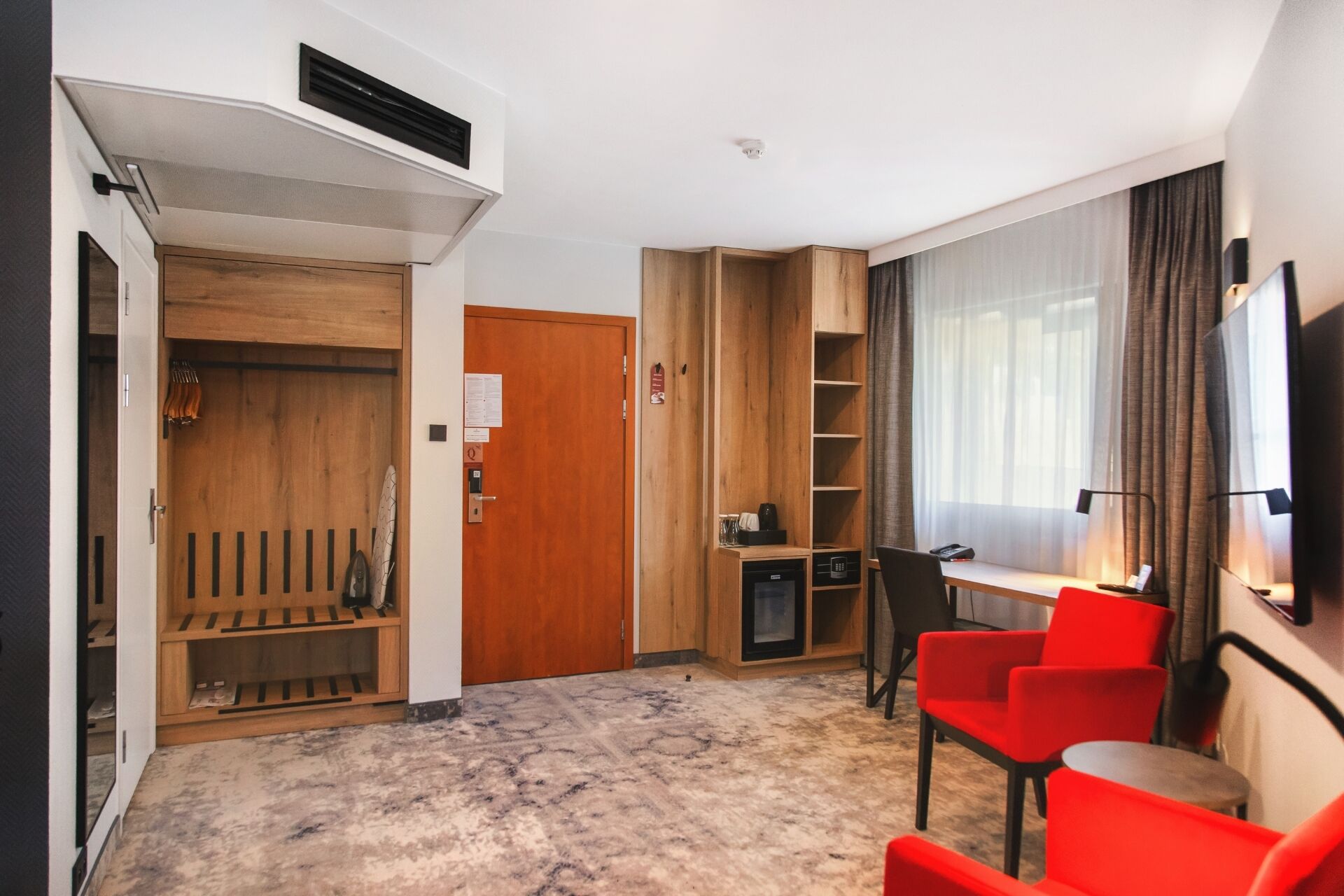junior suite | 1 bedroom, in-room safe, desk, blackout curtains