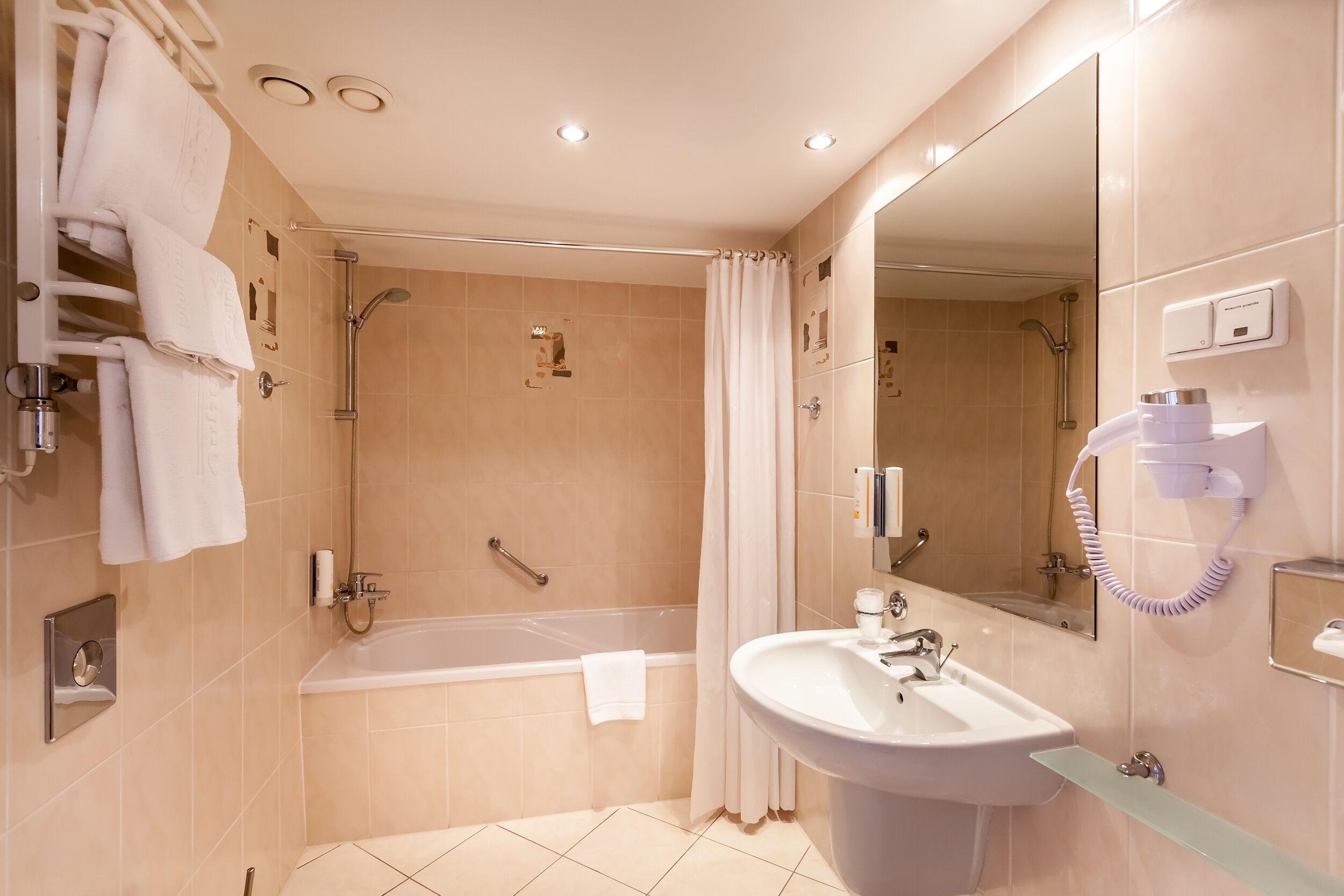 hair dryer, towels, soap, shampoo