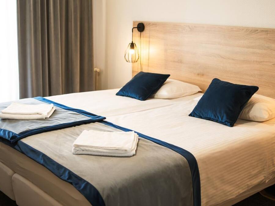 Double or Twin Room | Desk, iron/ironing board, free WiFi, bed sheets