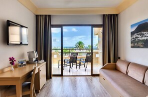 Minibar, desk, blackout curtains, bed sheets