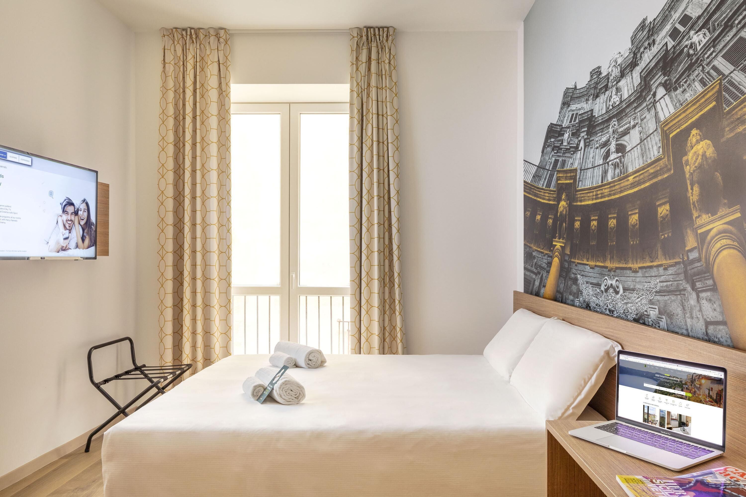 Memory-foam beds, in-room safe, desk, iron/ironing board