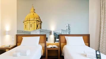 Memory-foam beds, in-room safe, desk, iron/ironing board