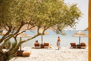 Sun-loungers, beach umbrellas, beach towels, scuba diving