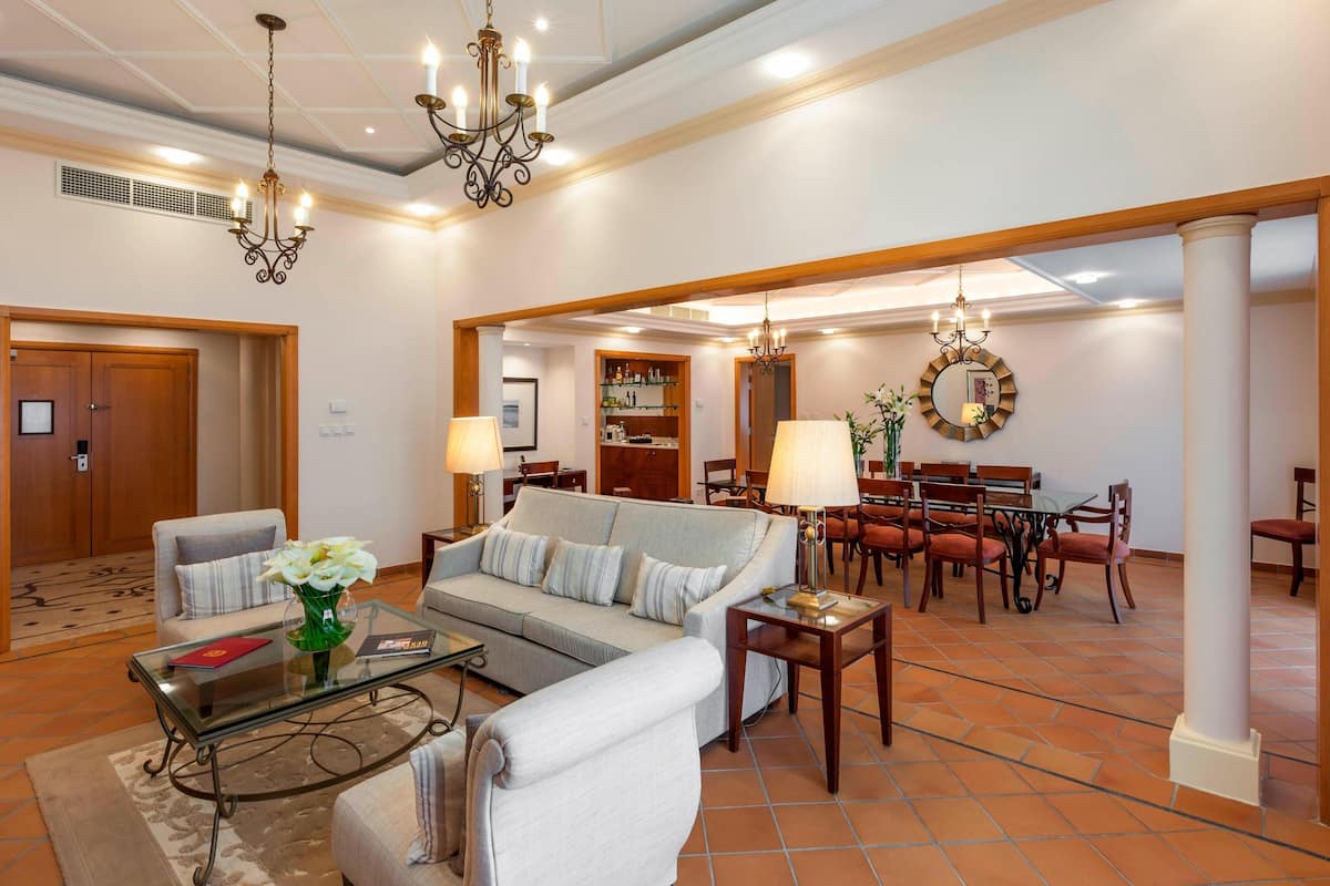 Presidential Suite, 1 Bedroom, Non Smoking | Living room | 32-inch flat-screen TV with cable channels, TV, toys