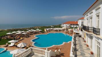 Indoor pool, outdoor pool, open 7:00 AM to 11:00 PM, pool umbrellas