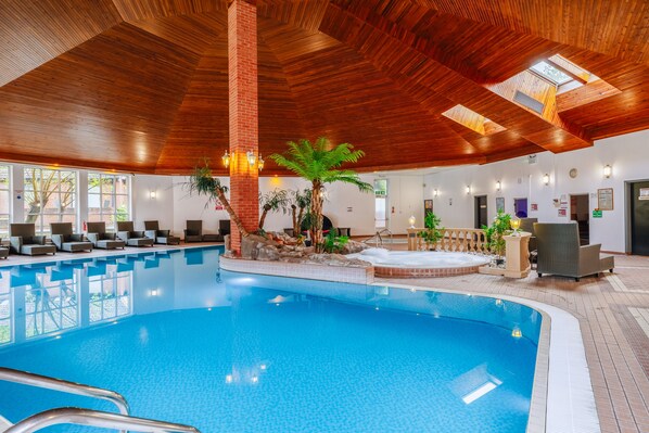 Indoor pool, open 7:30 AM to 8:30 PM, pool loungers