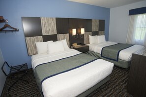 Deluxe Suite, Multiple Beds | Desk, blackout drapes, iron/ironing board, free WiFi