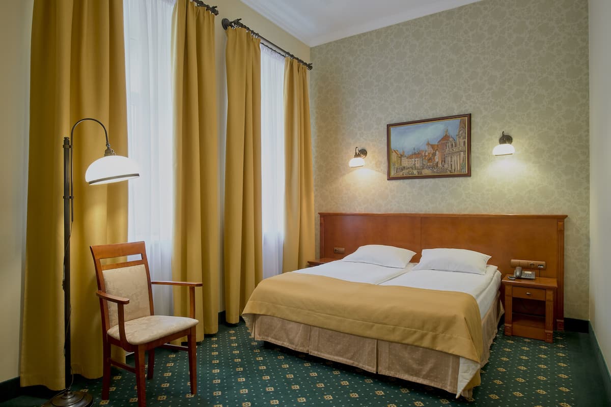 Desk, laptop workspace, free WiFi, bed sheets