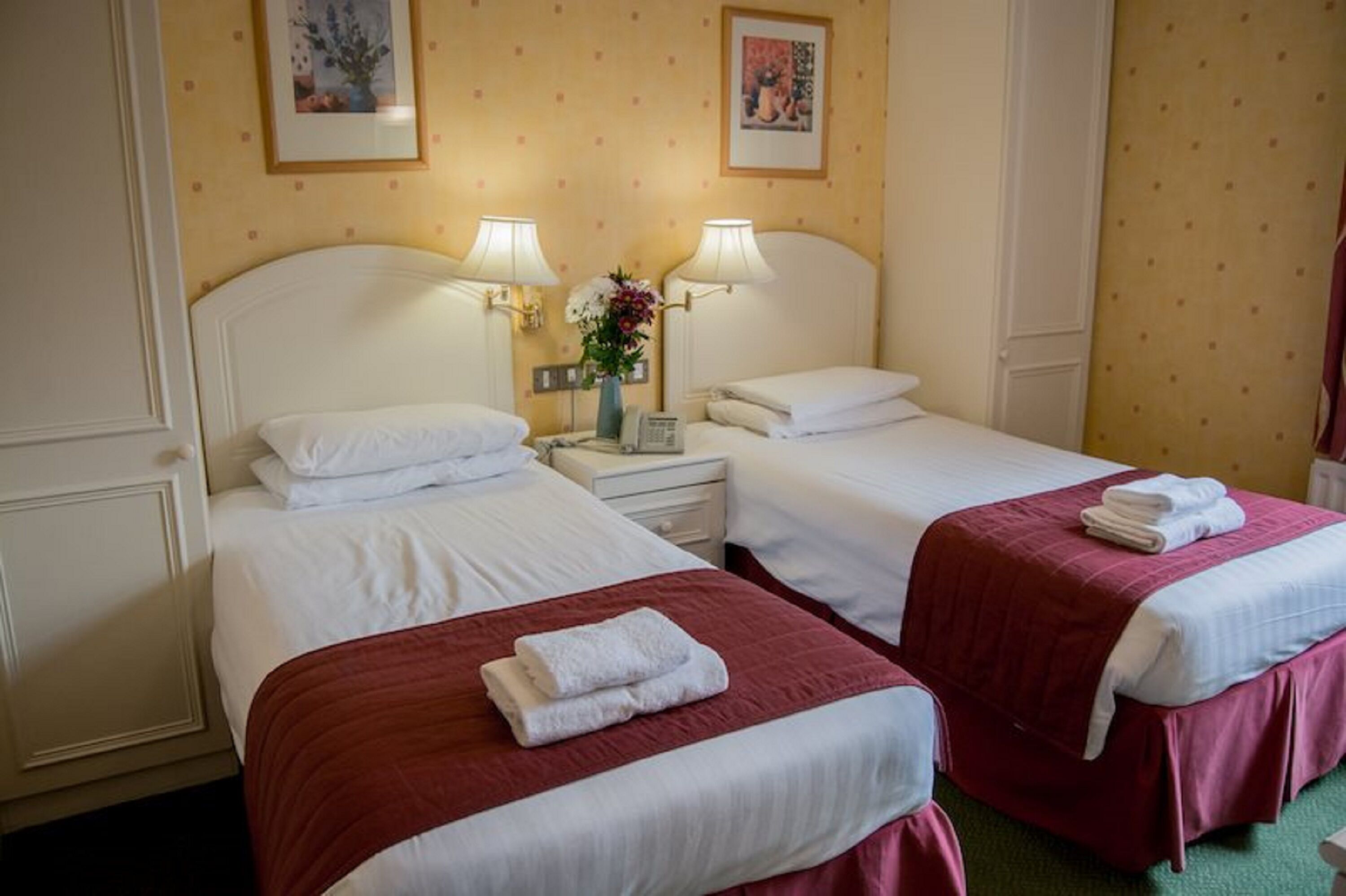 standard twin room | desk, iron/ironing board, bed sheets, alarm clocks