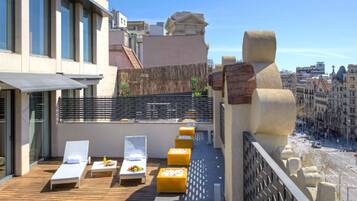 Suíte, terraço | Terraço/pátio