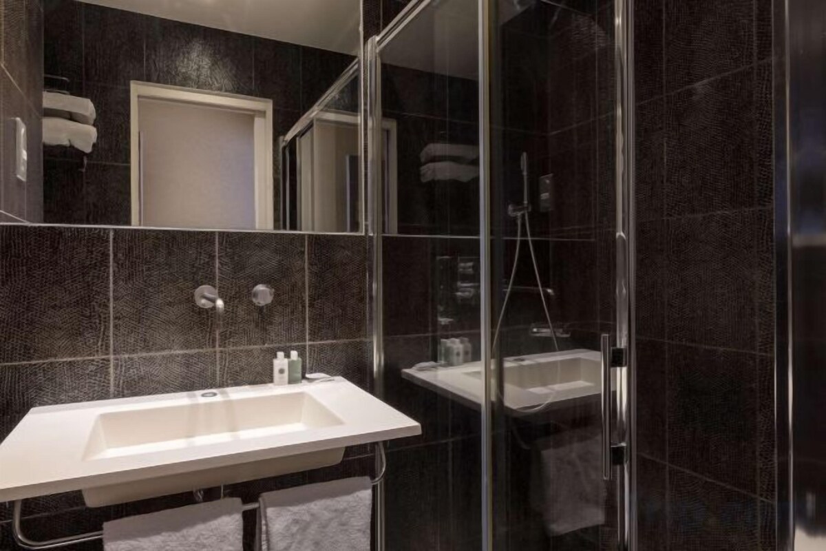 Bathroom | Shower, hair dryer, towels