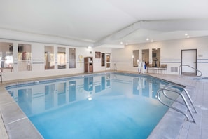 Indoor pool, open 8:00 AM to 10:00 PM, pool loungers