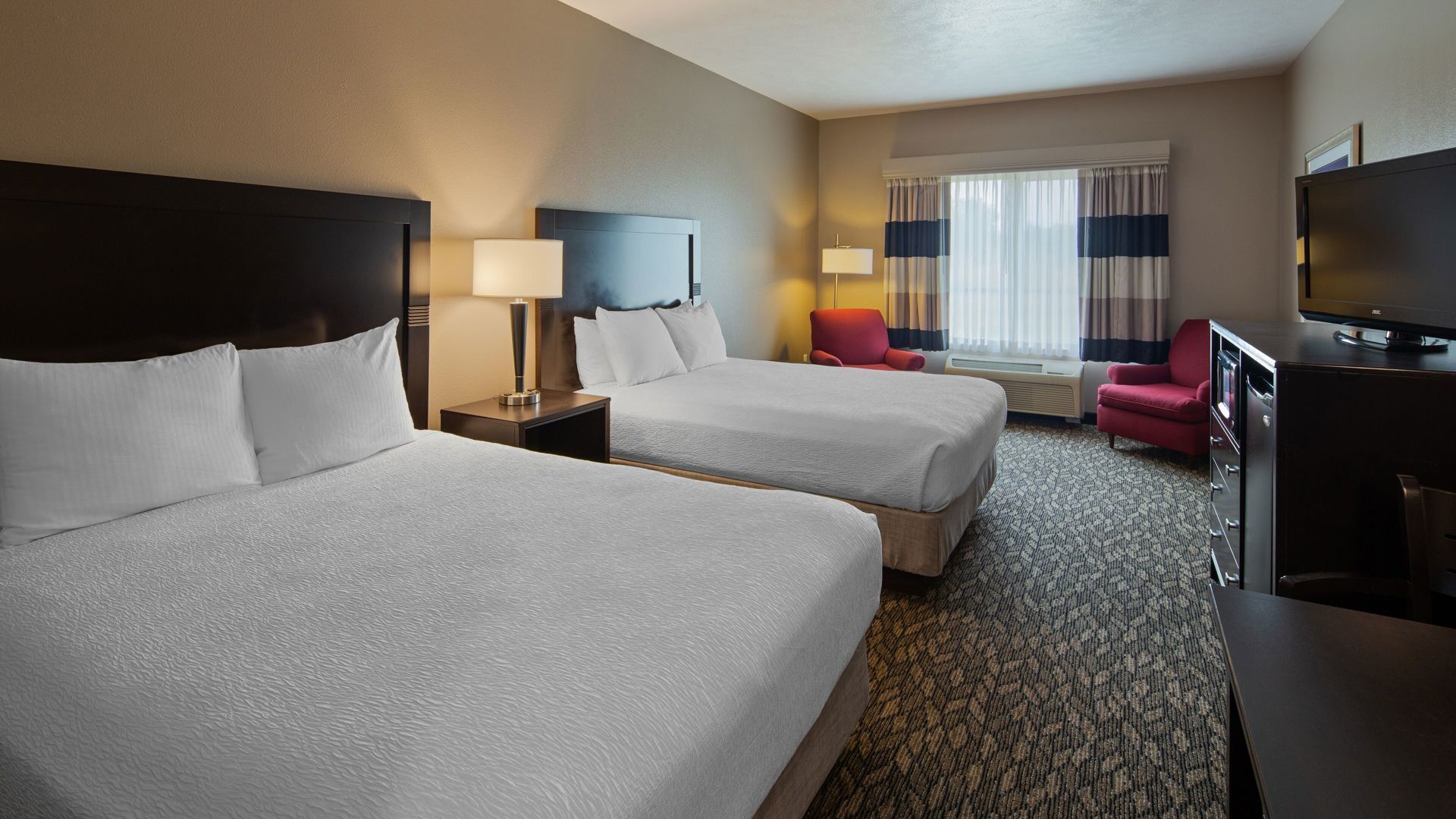 Desk, blackout curtains, iron/ironing board, free cots/infant beds