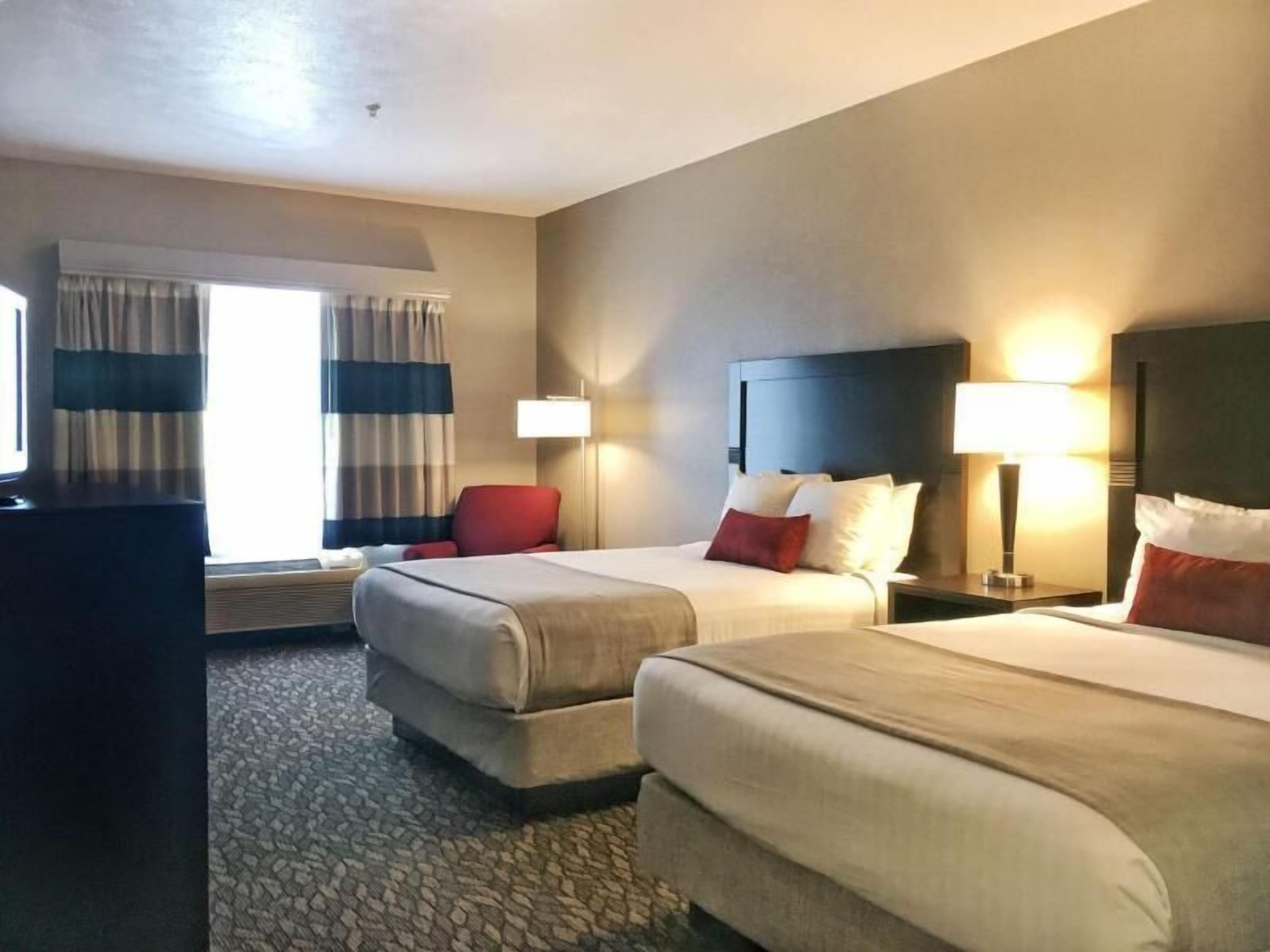 Desk, blackout curtains, iron/ironing board, free cots/infant beds