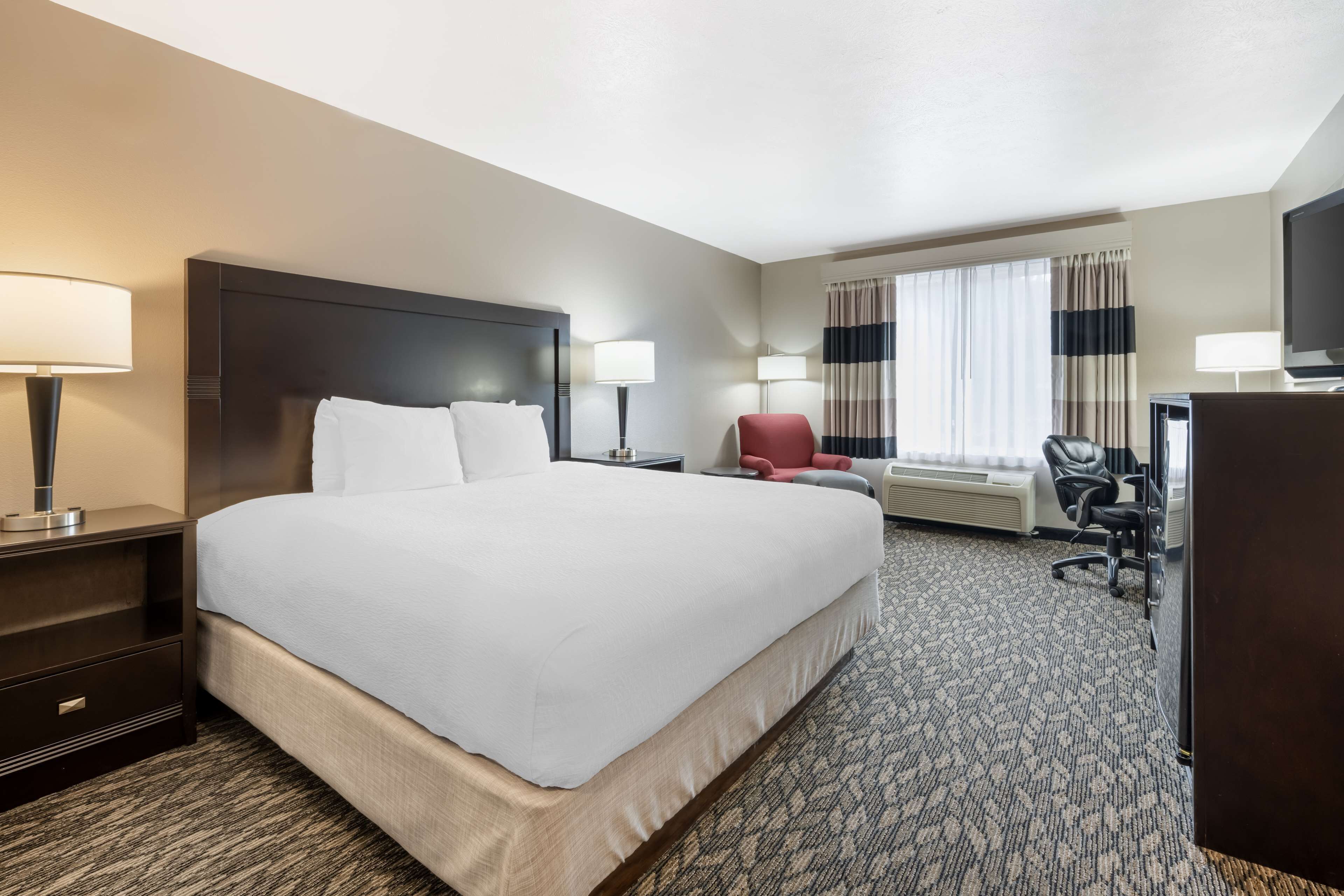 desk, blackout curtains, iron/ironing board, free cots/infant beds