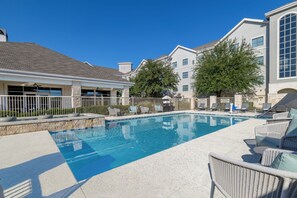 Outdoor pool, open 9:00 AM to 10:00 PM, pool umbrellas, sun loungers