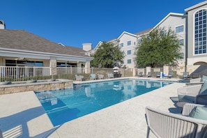 Outdoor pool, open 9:00 AM to 10:00 PM, pool umbrellas, sun loungers