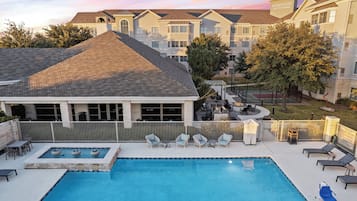 Outdoor pool, open 9:00 AM to 10:00 PM, pool umbrellas, pool loungers